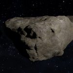 Asteroid de culoare inchisa prin spatiu interstelar